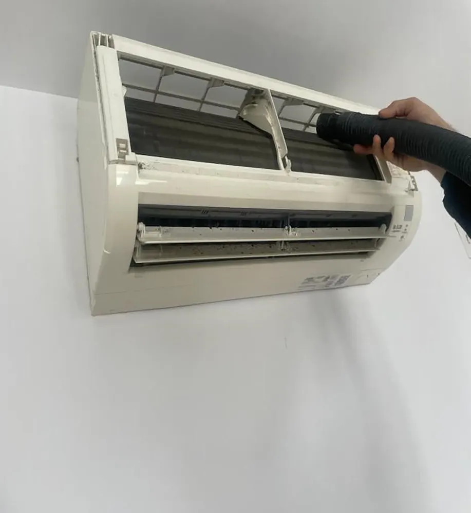 Chill Factor technician servicing a mini-split indoor unit