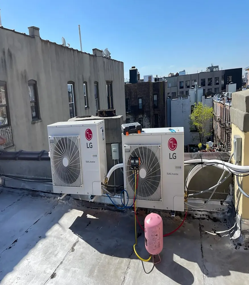 Residential AC condenser unit on a hot summer day